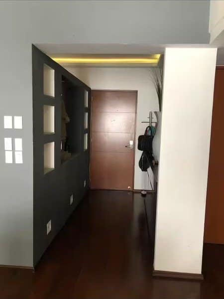 Pasillo de entrada del departamento en Grand Tower